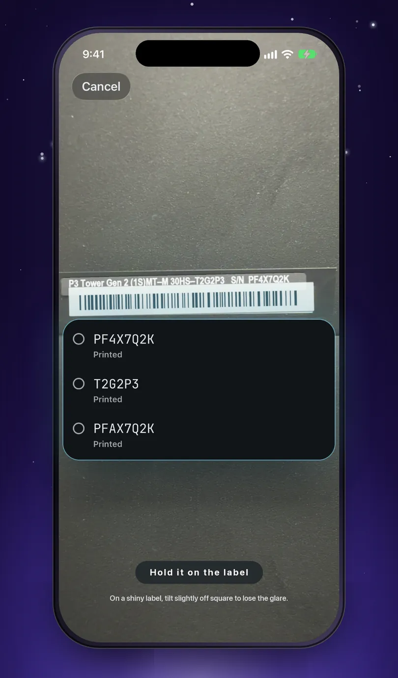 The iPhone camera held on a label with several barcodes, and a list of what was read so you can pick the serial: PF4X7Q2K, T2G2P3 and PFAX7Q2K.
