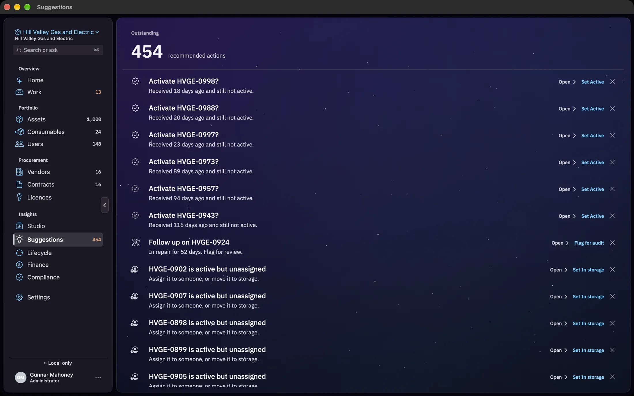 The Suggestions screen: Outstanding, 454 recommended actions, over a list of cards such as Activate HVGE-0998?, Follow up on HVGE-0924 and HVGE-0902 is active but unassigned, each with an icon, a title, a detail line, Open, an action such as Set Active, Flag for audit or Set In storage, and a dismiss cross.
